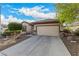Lovely single-story home featuring desert landscaping, a two-car garage, and a well-maintained driveway at 7927 Crested Starling Ct, North Las Vegas, NV 89084