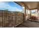 Comfortable covered patio with outdoor seating, perfect for relaxing and entertaining at 7927 Crested Starling Ct, North Las Vegas, NV 89084