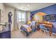 Unique bedroom showcasing creative decor, a vibrant color scheme, and a sporty, personalized touch at 799 Calm Crystal Ct # Lot 142, North Las Vegas, NV 89081
