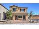 Charming two-story home boasts a well-manicured front yard and inviting curb appeal at 799 Calm Crystal Ct # Lot 142, North Las Vegas, NV 89081