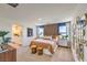 Stylish primary bedroom with neutral tones, modern decor, and natural light, creating a relaxing atmosphere at 799 Calm Crystal Ct # Lot 142, North Las Vegas, NV 89081