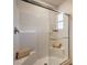 Clean, well-maintained shower with tiled walls, built-in seating, and a modern glass enclosure at 799 Calm Crystal Ct # Lot 142, North Las Vegas, NV 89081