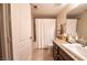 Neutral bathroom featuring a granite countertop, tile flooring, and a bathtub with shower at 8101 W Flamingo Rd # 2006, Las Vegas, NV 89147