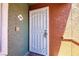Front door entrance featuring ornate wrought iron door and lockbox at 8101 W Flamingo Rd # 2006, Las Vegas, NV 89147