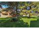 A relaxing green space offers mature trees and picnic tables, creating a perfect spot to unwind and enjoy nature at 8101 W Flamingo Rd # 2006, Las Vegas, NV 89147