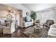 Cozy living room with hardwood floors, neutral paint, and modern ceiling fan at 8101 W Flamingo Rd # 2006, Las Vegas, NV 89147