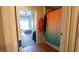 Bathroom view into adjacent bedroom and stall shower with colorful curtain at 8255 S Las Vegas Blvd # 1514, Las Vegas, NV 89123
