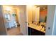 Bathroom featuring updated fixtures, a pedestal sink, and stylish lighting at 8255 S Las Vegas Blvd # 1514, Las Vegas, NV 89123