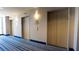 Hallway featuring multiple elevators providing convenient access to various floors in the building at 8255 S Las Vegas Blvd # 1514, Las Vegas, NV 89123