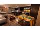 Fun recreation room with a pool table, foosball, and comfortable seating for entertainment at 8255 S Las Vegas Blvd # 1514, Las Vegas, NV 89123