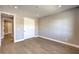 Neutral bedroom with hardwood floors and closet at 8316 Broad Peak Dr, Las Vegas, NV 89131