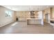 Open kitchen with a large island, stainless steel appliances, ample cabinetry, and a wine refrigerator at 8316 Broad Peak Dr, Las Vegas, NV 89131