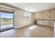Bright, open kitchen featuring a wine refrigerator, ample counter space, and easy access to outdoor views at 8316 Broad Peak Dr, Las Vegas, NV 89131