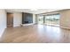 Spacious living room with fireplace and sliding glass doors to the outside at 8316 Broad Peak Dr, Las Vegas, NV 89131