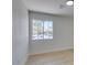 Cozy bedroom features light wood floors, a window with a view, and ample natural light at 9520 Sundial Dr, Las Vegas, NV 89134