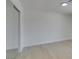 Bright bedroom features light wood floors, white walls, and ample natural light at 9520 Sundial Dr, Las Vegas, NV 89134