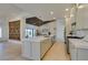 Spacious kitchen boasts a large island, stainless steel appliances, modern countertops, and an open floor plan at 9520 Sundial Dr, Las Vegas, NV 89134