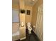 Cozy bathroom with modern toilet, stylish tile floor, and natural light at , Henderson, NV 89052