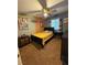Stylish bedroom with a playful color palette, including a black bed frame and colorful decorative accents at , Henderson, NV 89052