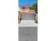 Charming two-story home with a tile roof and a two-car garage in a well-maintained neighborhood at , Henderson, NV 89052