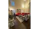 Bright living room with high ceilings, features modern decor, dark hardwood floors, and comfortable seating at , Henderson, NV 89052