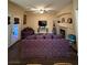 Spacious living room features a ceiling fan, fireplace, and access to the backyard through glass doors at , Henderson, NV 89052