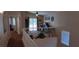 Bright loft features a sliding glass door, ceiling fan, neutral paint, and a view to the main level below at , Henderson, NV 89052