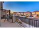 Enjoy community views from the balcony featuring a table and chairs at 10047 Alden Creek St, Las Vegas, NV 89141