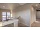 Upstairs hallway showcasing the home's neutral color palette and natural light at 10047 Alden Creek St, Las Vegas, NV 89141