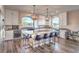 A chef's dream kitchen with a massive island, stainless steel oven and seating for seven at 10047 Alden Creek St, Las Vegas, NV 89141