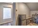 This room features a small refrigerator and shelving with a window for natural light at 10047 Alden Creek St, Las Vegas, NV 89141