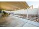 Backyard patio area with concrete paving, perfect for outdoor dining or relaxing, has potential for personalization at 1012 Greystone Dr, Las Vegas, NV 89108