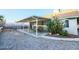 Backyard with a covered patio, gravel landscaping, and potential for outdoor entertaining and relaxation at 1012 Greystone Dr, Las Vegas, NV 89108