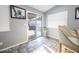 Bright breakfast nook with large sliding glass doors and sunlit tile flooring at 1012 Greystone Dr, Las Vegas, NV 89108