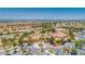 An aerial shot of community clubhouse featuring well-kept landscaping and ample parking at 10301 Bent Brook Pl, Las Vegas, NV 89134