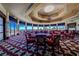 Spacious dining area with elegant furnishings and panoramic views of the surrounding landscape at 10301 Bent Brook Pl, Las Vegas, NV 89134