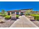 Well-maintained fitness center entrance with welcoming signage, trimmed shrubs, and accessible pathway at 10301 Bent Brook Pl, Las Vegas, NV 89134