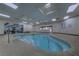 Features an indoor pool with step entry, grab rails, and large viewing windows at 10301 Bent Brook Pl, Las Vegas, NV 89134