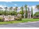 Siena Golf Club entrance with manicured lawns, lush greenery, and elegant signage welcomes you to a vibrant community at 10302 Cara Mia Ct, Las Vegas, NV 89135