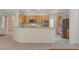 Well-equipped kitchen featuring stainless steel appliances, ample cabinet space, and a breakfast bar at 10302 Cara Mia Ct, Las Vegas, NV 89135
