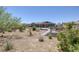 Expansive backyard with covered patio, lush landscaping, and relaxing space for outdoor enjoyment at 11088 Westcroft Way, Las Vegas, NV 89183