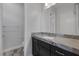 Stylish bathroom features granite countertops, modern cabinets and fixtures, offering a sleek look at 11088 Westcroft Way, Las Vegas, NV 89183