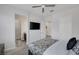 Bright bedroom with a TV, and bathroom and doorway views, creating a modern and open feel at 11088 Westcroft Way, Las Vegas, NV 89183