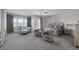 Spacious primary bedroom featuring sitting area, neutral color palette, and natural light at 11088 Westcroft Way, Las Vegas, NV 89183