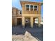Unfinished new construction showing the framing for this two-story home at 124 Silver Run Ln, Las Vegas, NV 89138