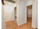 Hallway with a laundry closet and a door to the bathroom at 1259 Plum Canyon St, Las Vegas, NV 89142