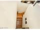 Stairway with wood stairs and white walls at 1259 Plum Canyon St, Las Vegas, NV 89142