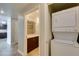 This bathroom features a stacked washer/dryer and a double sink at 150 Las Vegas Blvd # 2003, Las Vegas, NV 89101