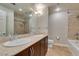 Bright bathroom featuring double sinks, stone countertops, and tile flooring at 150 Las Vegas Blvd # 2003, Las Vegas, NV 89101