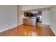 Bright living area with hardwood floors, and kitchen with stainless steel appliances at 150 Las Vegas Blvd # 2003, Las Vegas, NV 89101